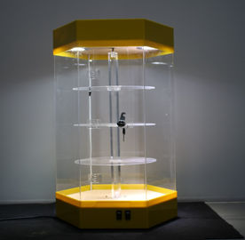 Chine Belle base acrylique rotative de jaune de support de présentoirs verrouillable avec la lumière menée fournisseur