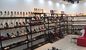 Conception adaptée aux besoins du client par étalage populaire simple de support d'étagères de chaussure de vente au détail en métal fournisseur